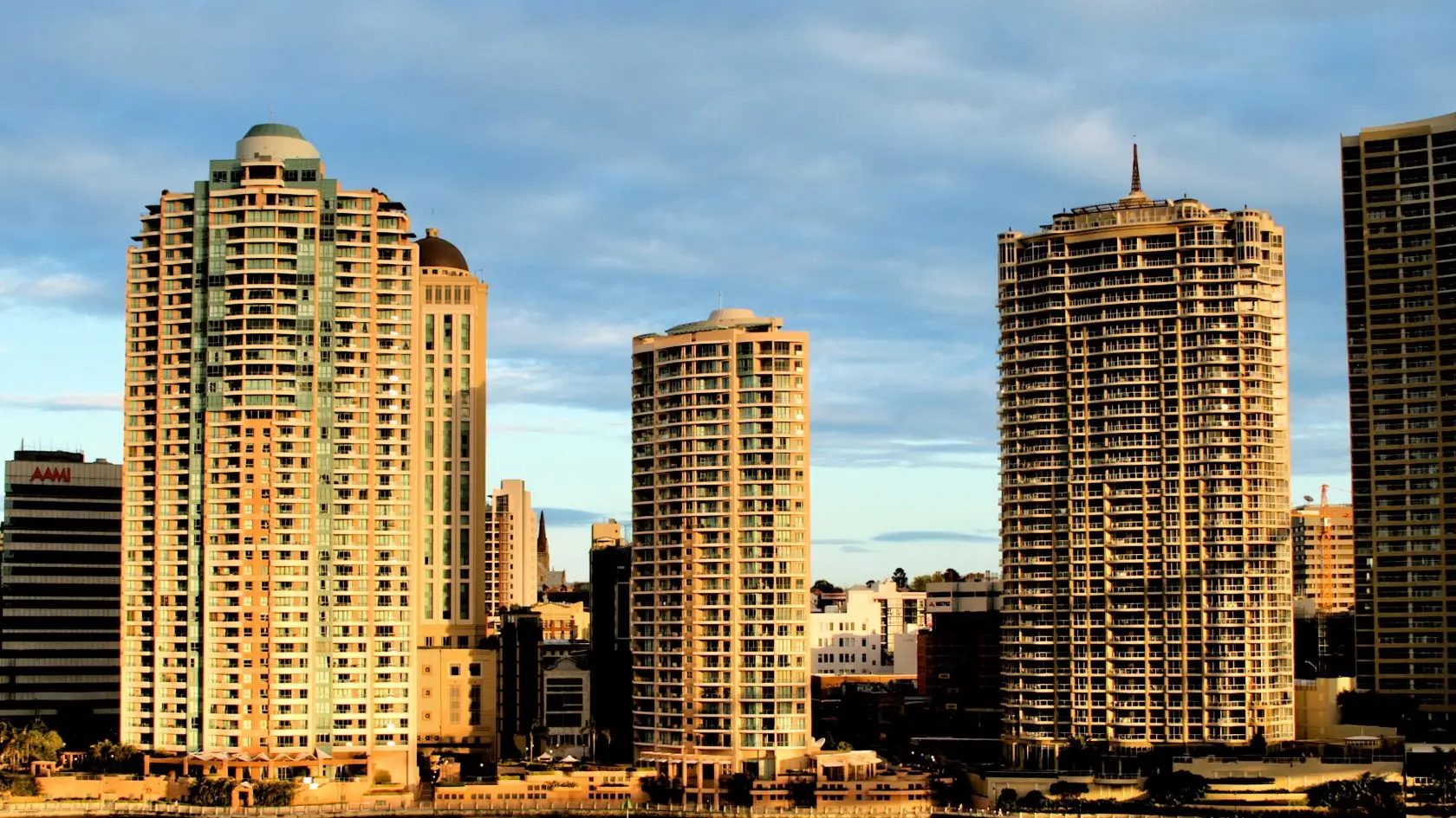 Brisbane riverfront towers in late afternoon light